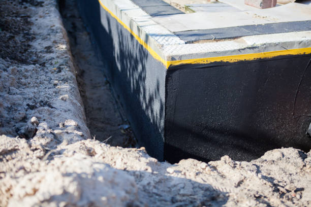 Professional Basement Waterproofing technician working in Somerset, IN